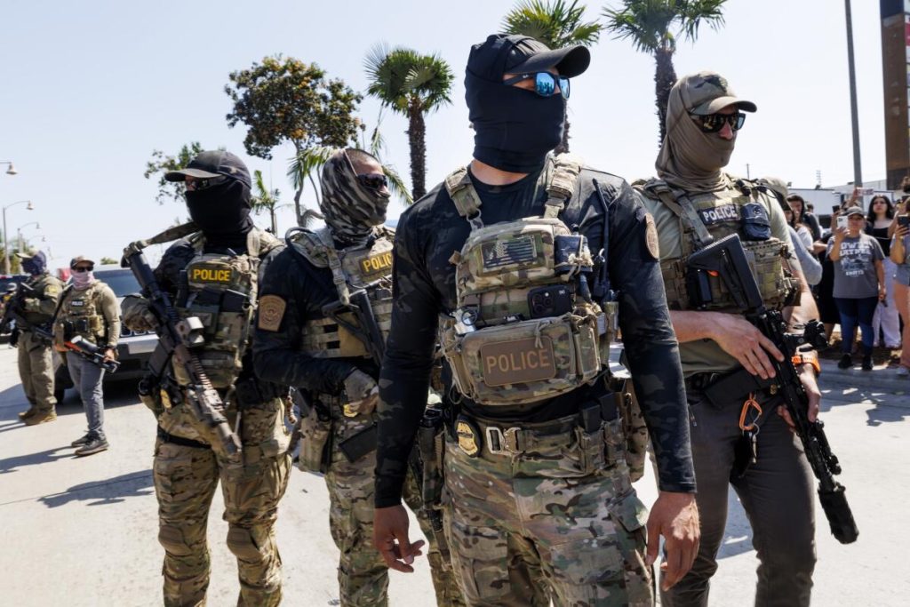 Who are these people?' Masked immigration agents challenge local ...